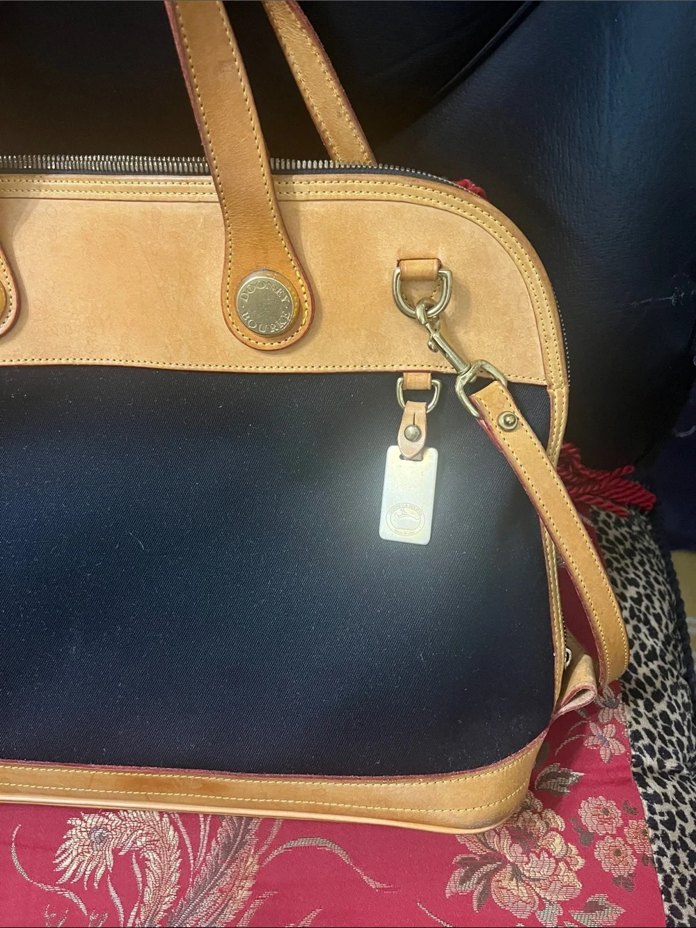 Dooney & Bourke Black and Tan Satchel with Gold Hardware